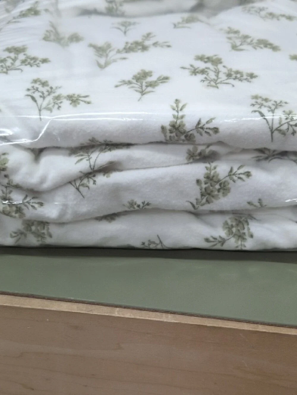 Garnet Hill Cream Duvet Cover with Green Floral Print.